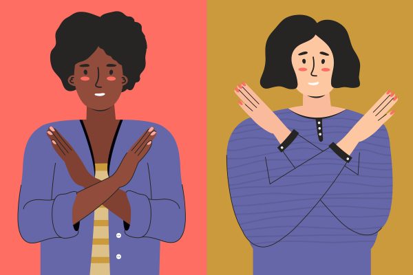 women signaling "break the bias"