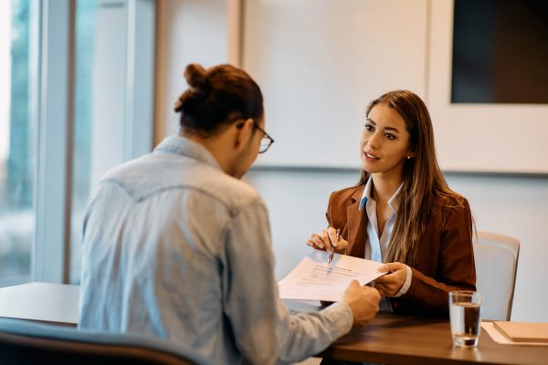 manager reviewing policies with employee