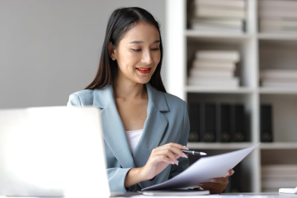 HR professional reviewing checklist